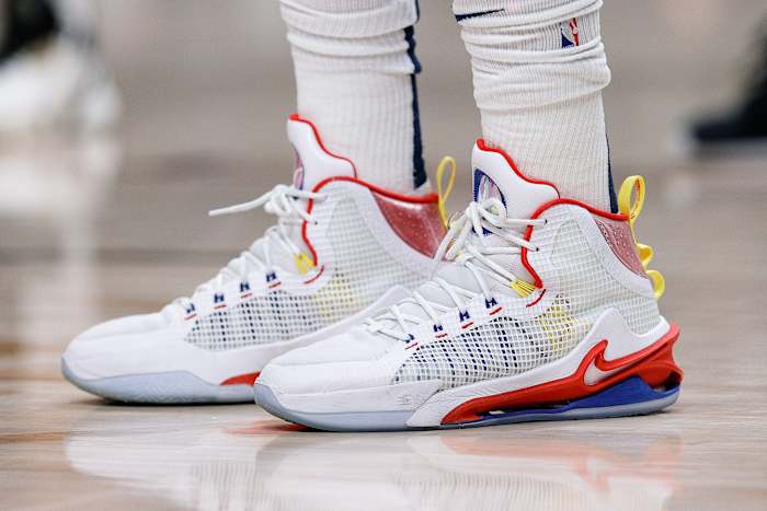 View of Nikola Jokic's white, red, and blue Nike shoes.