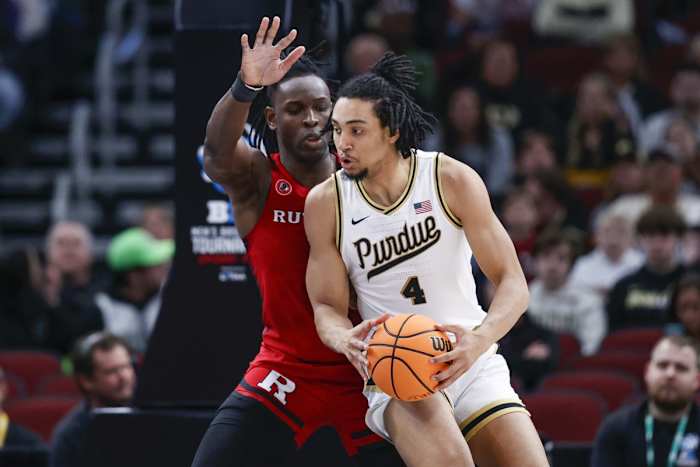 Rutgers Scarlet Knights center Clifford Omoruyi (11) defends against Purdue Boilermakers forward Trey Kaufman-Renn (4) during the first half at United Center.