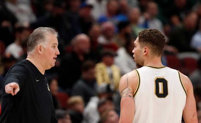 Coach Matt Painter talks to Purdue Boilermakers forward Mason Gillis (0) during the Big Ten Men s Basketball Tournament game against the Rutgers Scarlet Knights.