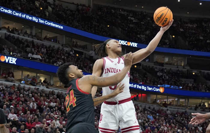 Indiana Hoosiers forward Malik Reneau (5) attempts a shot while Donta Scott (24) defends during the first half at United Center.