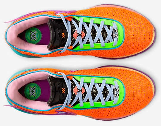 View of orange, purple, and pink Nike LeBron shoes.