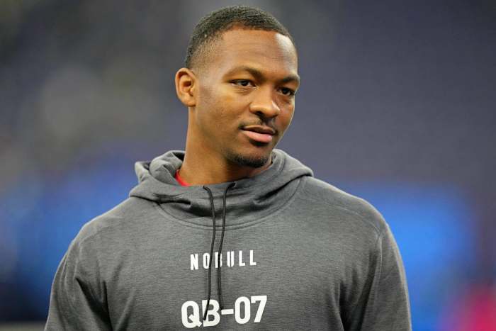 Mar 4, 2023; Indianapolis, IN, USA; Tennessee quarterback Hendon Hooker (QB07) looks on at Lucas Oil Stadium.