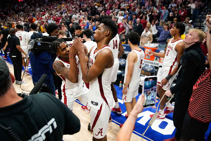 Alabama forwards Nick Pringle (23) and Brandon Miller (24) celebrate winning the championship SEC Men s Basketball Tournament game over Texas A&M at Bridgestone Arena Sunday, March 12, 2023