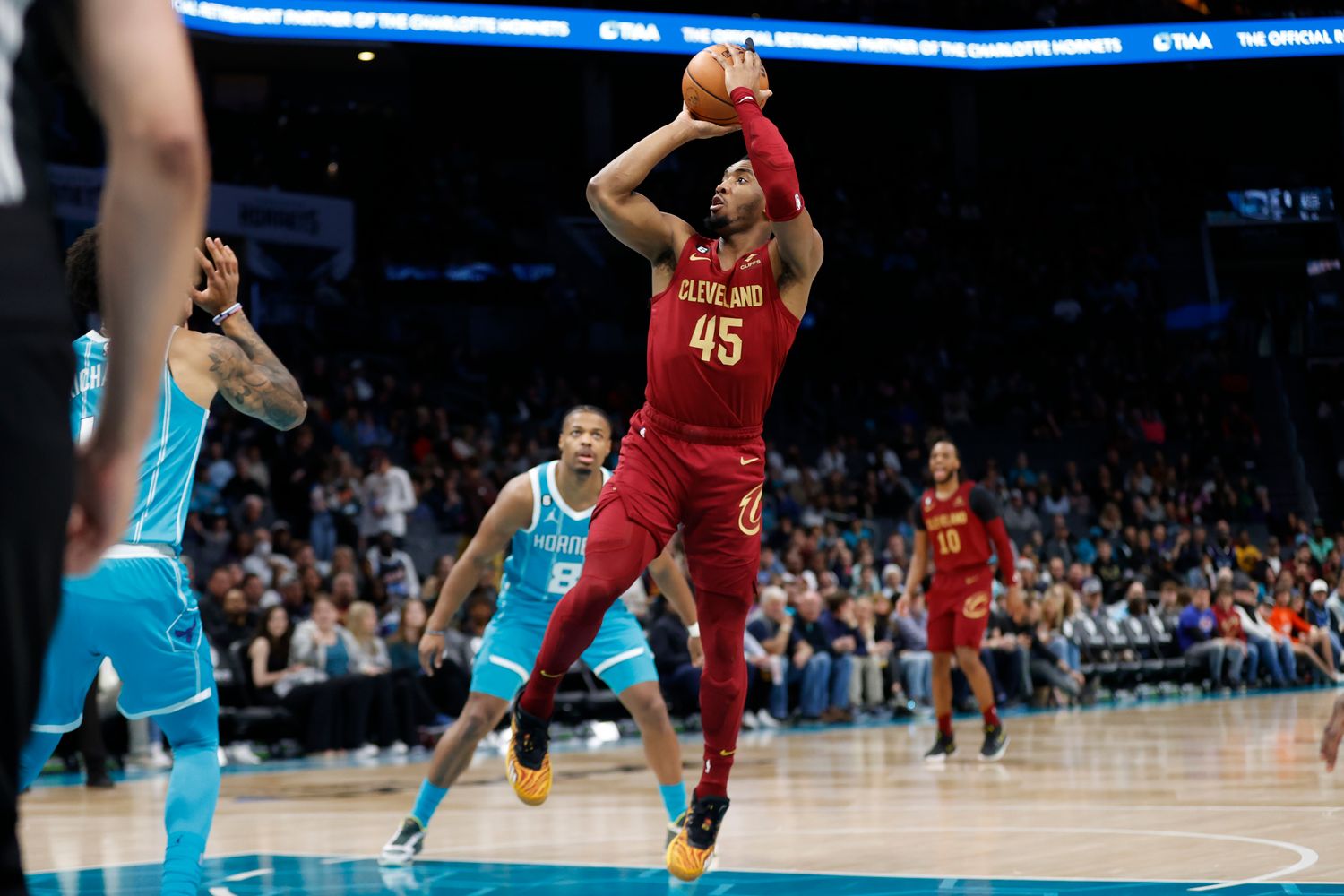 Mar 12, 2023; Charlotte, North Carolina, USA; Cleveland Cavaliers guard Donovan Mitchell (45) attempts a jump shot during the first half against the Charlotte Hornets at Spectrum Center. Mandatory Credit: Brian Westerholt-USA TODAY Sports