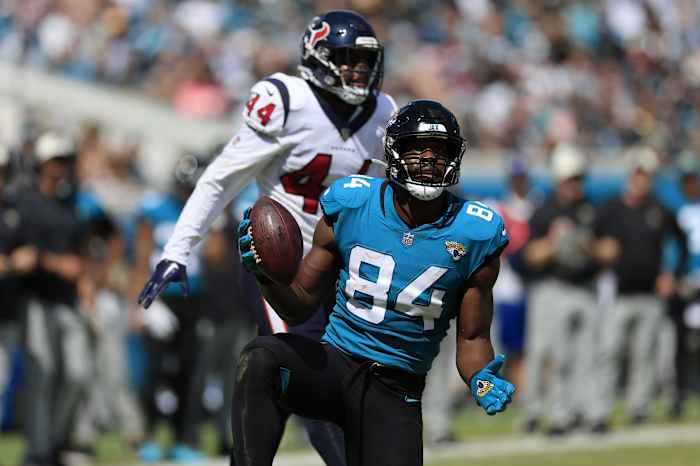 Jacksonville Jaguars tight end Chris Manhertz (84) reacts to coming up short against Houston Texans linebacker Jalen Reeves-Maybin (44) during the first quarter of an NFL football game Sunday, Oct. 9, 2022 at TIAA Bank Field in Jacksonville. The Texans won 13-6. [Corey Perrine/Florida Times-Union] Jki 100822 Texans Jags Cp 56