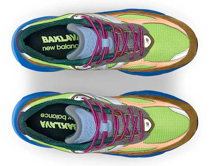 View of brown, blue, and green New Balance shoes.
