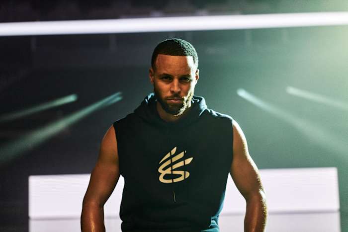 Stephen Curry models Under Armour apparel in a photo shoot.