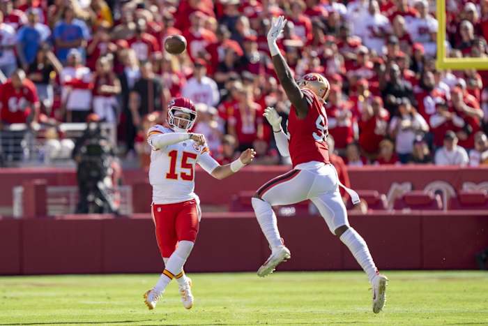 October 23, 2022; Santa Clara, California, USA; Kansas City Chiefs quarterback Patrick Mahomes (15) passes the football against San Francisco 49ers defensive end Charles Omenihu (94) during the second quarter at Levi's Stadium. Mandatory Credit: Kyle Terada-USA TODAY Sports