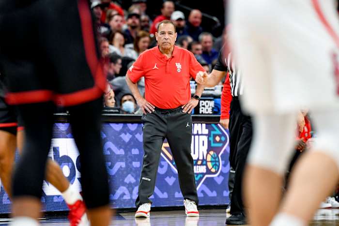 Kelvin Sampson watches his Houston team from courtside.