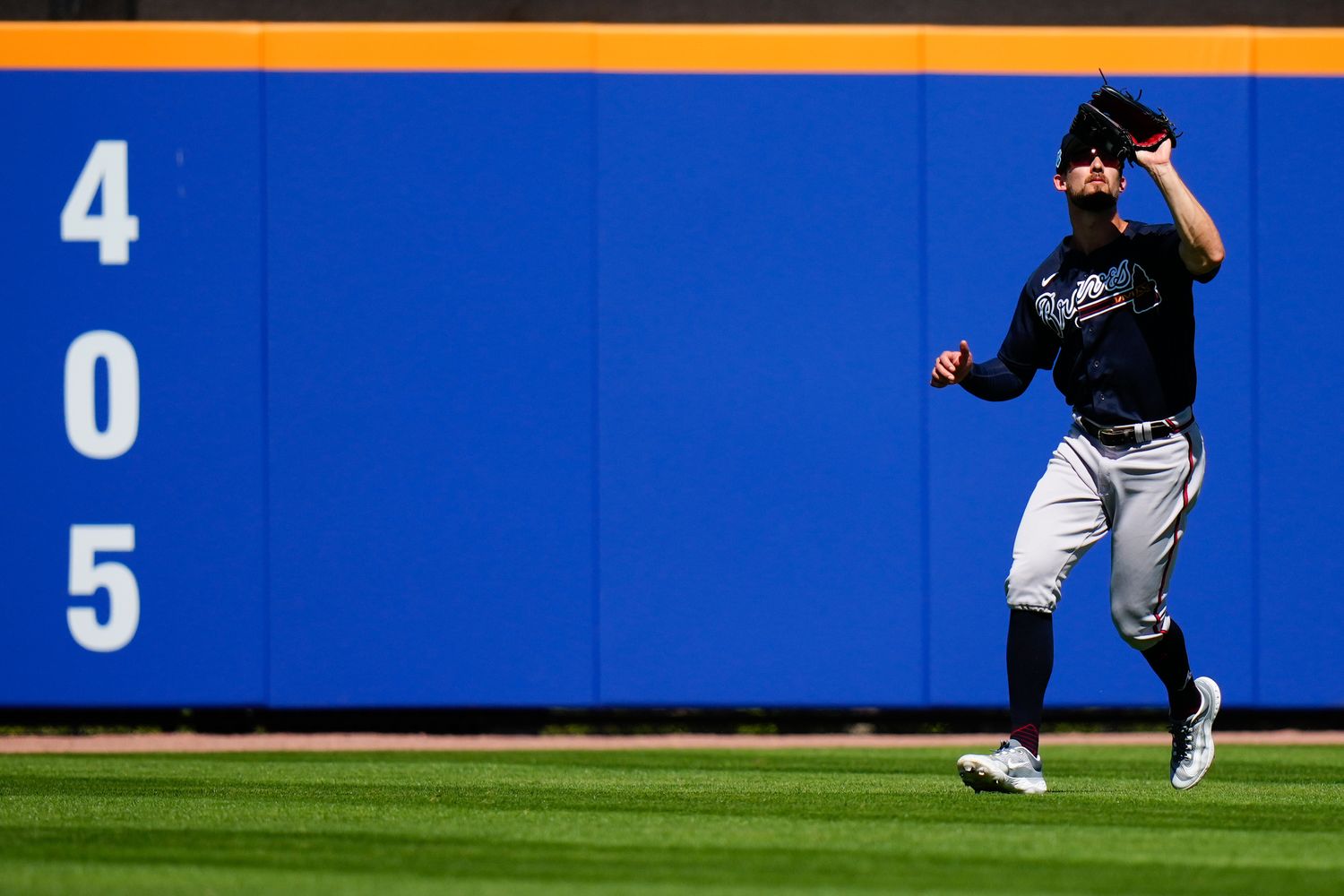Mar 2, 2023; Port St. Lucie, Florida, USA; Atlanta Braves center fielder Eli White (38) catches a fly ball against the New York Mets during the second inning at Clover Park.
