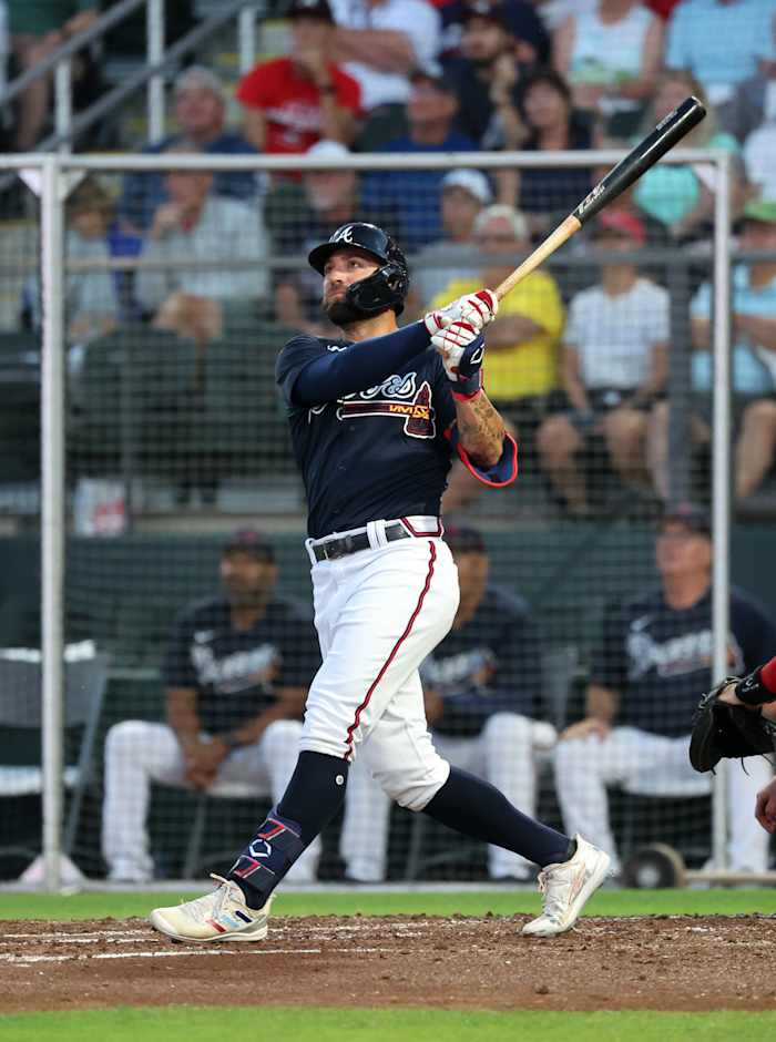Mar 7, 2023; North Port, Florida, USA; Atlanta Braves outfielder Kevin Pillar (17) hits a home run during the third inning against the Boston Red Sox at CoolToday Park.