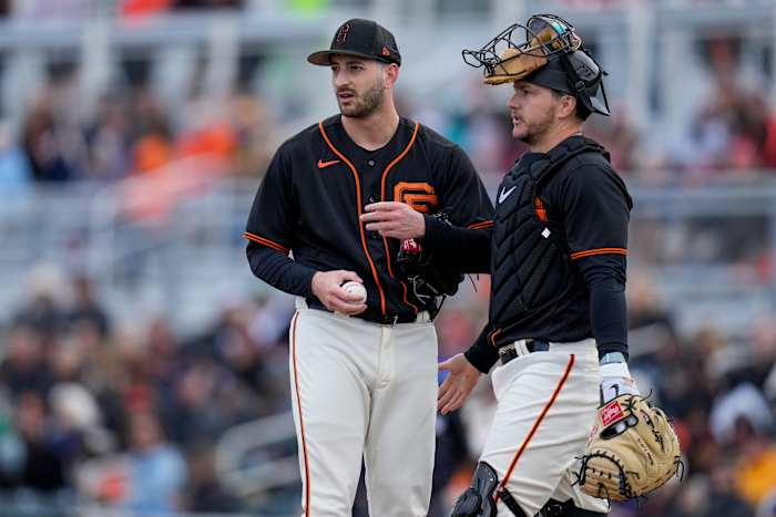 SF Giants pitcher Thomas Szapucki is visited at the mound by catcher Patrick Bailey in the sixth inning of the MLB Cactus League spring training game. (2023)