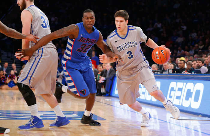 Mar 13, 2014; New York, NY, USA; Creighton Bluejays forward Doug McDermott (3) drives to the basket against DePaul Blue Demons guard Charles McKinney (32) in the second round of the Big East college basketball tournament at Madison Square Garden