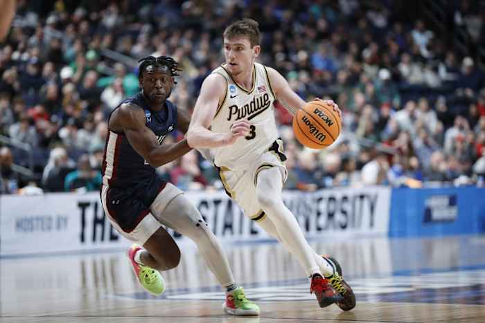 Braden Smith (3) dribbles the ball defended by Fairleigh Dickinson Knights guard Demetre Roberts (2) in the first half at Nationwide Arena.