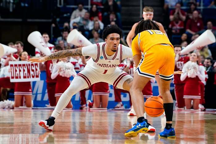 Golden Flashes guard Jalen Sullinger (13) dribbles the ball up court against Indiana Hoosiers guard Jalen Hood-Schifino (1).