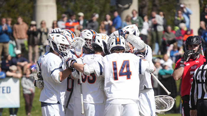 The Virginia men's lacrosse team huddles during the game against Maryland at Klockner Stadium.