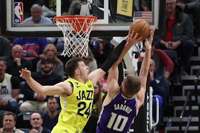 Utah Jazz center Walker Kessler (24) blocks the shot of Sacramento Kings forward Domantas Sabonis (10) in the fourth quarter at Vivint Arena.
