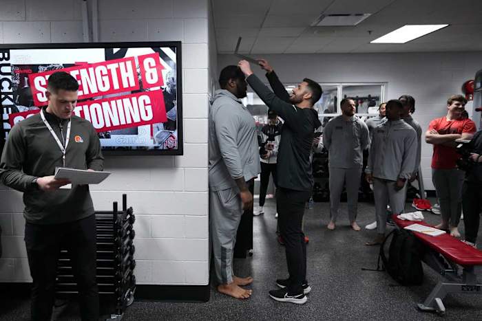 Ohio State Buckeyes offensive tackle Dawand Jones is measured during Ohio State football s pro day at the Woody Hayes Athletic Center in Columbus on March 22, 2023. Football Ceb Osufb Pro Day