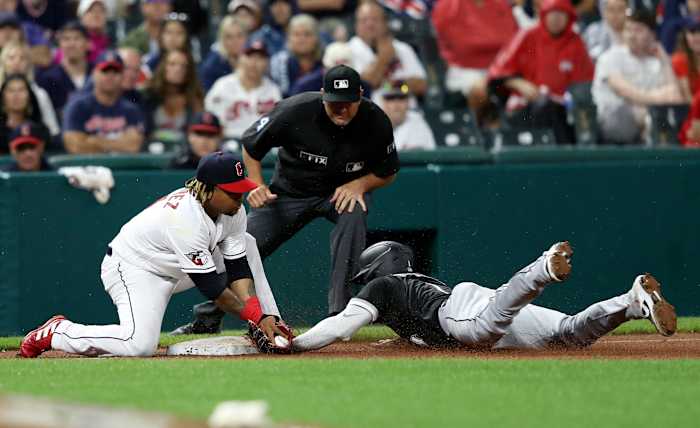 Aug 20, 2022; Cleveland, Ohio, USA; Chicago White Sox shortstop Elvis Andrus (1) steals third base ahead of the tag of Cleveland Gladiators third baseman Jose Rameriz (11) in the seventh inning at Progressive Field. Mandatory Credit: Aaron Josefczyk-USA TODAY Sports