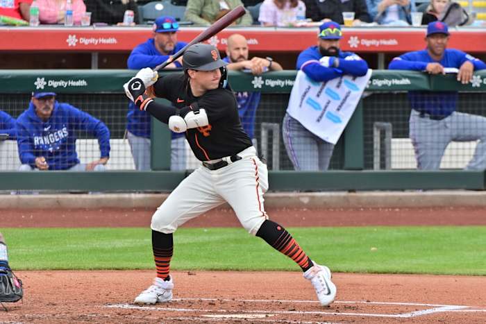 SF Giants DH Casey Schmitt at bat against the Texas Rangers during a Spring Training game. (2023)