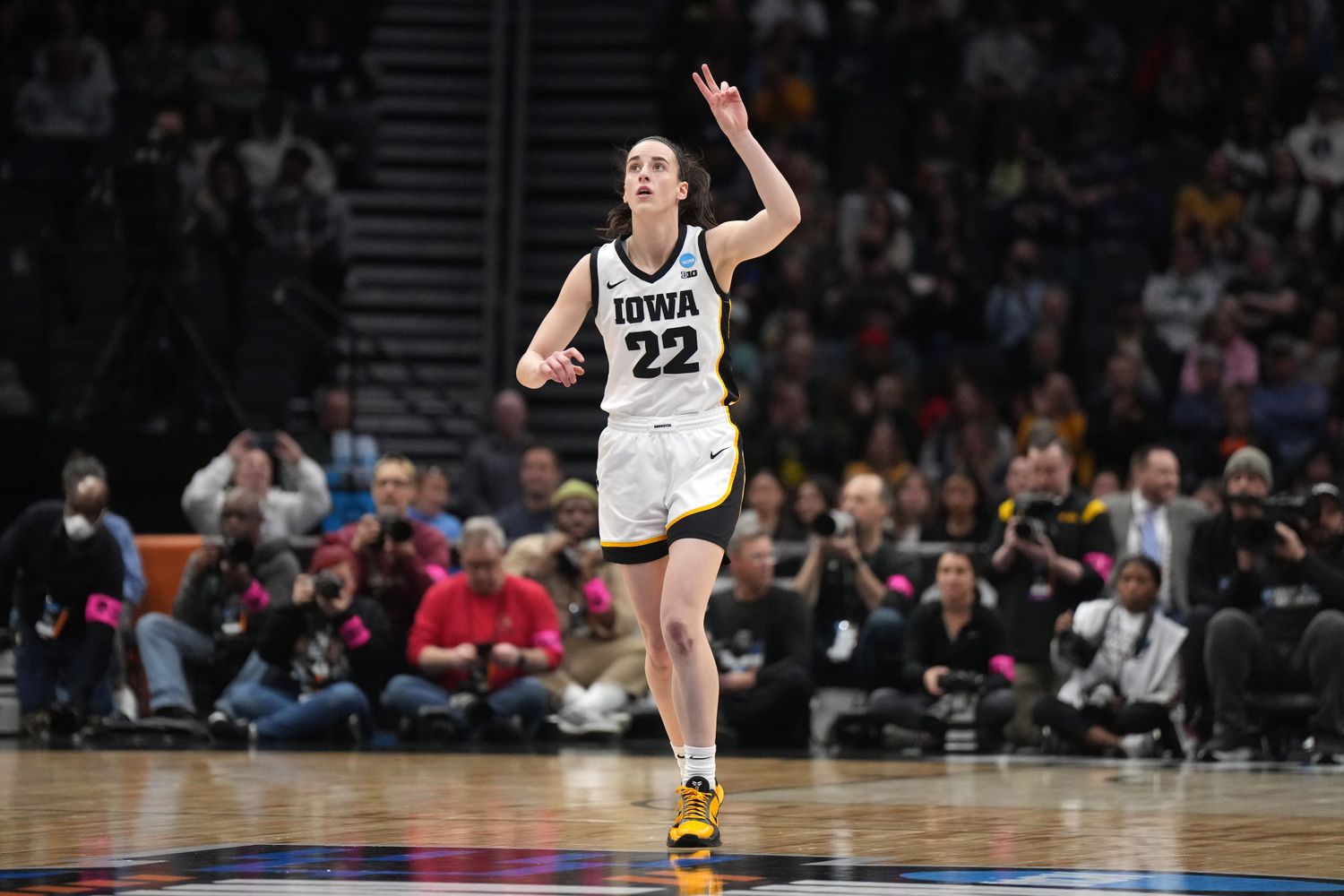 Iowa Hawkeyes guard Caitlin Clark reacts during a game.