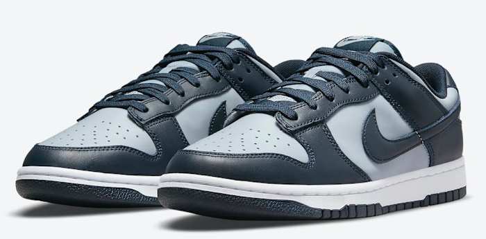 Navy and grey Nike Dunk sneakers.
