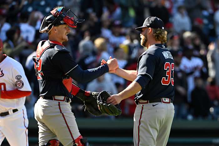 Mar 30, 2023; Washington, District of Columbia, USA; Atlanta Braves relief pitcher A.J. Minter (33) and catcher Sean Murphy (12) celebrate after the game against the Washington Nationals at Nationals Park. Mandatory Credit: Brad Mills-USA TODAY Sports