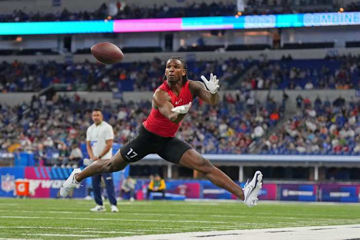 Mar 4, 2023; Indianapolis, IN, USA; West Virginia wide receiver Bryce Ford-Wheaton (WO17) participates in drills at Lucas Oil Stadium.