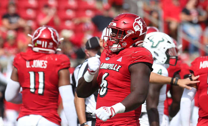 Louisville s YaYa Diaby celebrates his sack against USF.