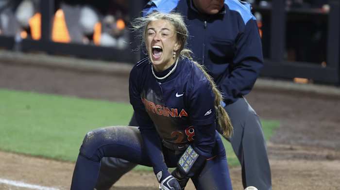 Leah Boggs reacts after scoring the game-winning run for the Virginia softball team against Virginia Tech at Palmer Park.