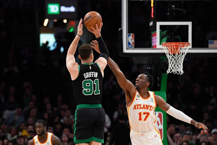 Boston Celtics forward Blake Griffin shoots the ball over Atlanta Hawks forward Onyeka Okongwu.