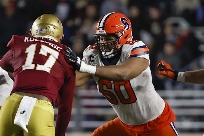 Syracuse Orange offensive lineman Matthew Bergeron (60) blocks against the Boston College Eagles. Mandatory Credit: Winslow Townson-USA TODAY