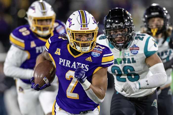 Dec 27, 2022; Birmingham, Alabama, USA; East Carolina Pirates running back Keaton Mitchell (2) runs for a gain against the Coastal Carolina Chanticleers in the 2022 Birmingham Bowl at Protective Stadium. Mandatory Credit: Vasha Hunt-USA TODAY Sports