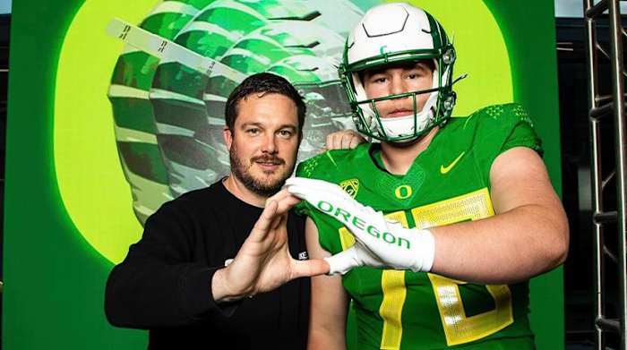 Trent Ferguson poses with Dan Lanning.