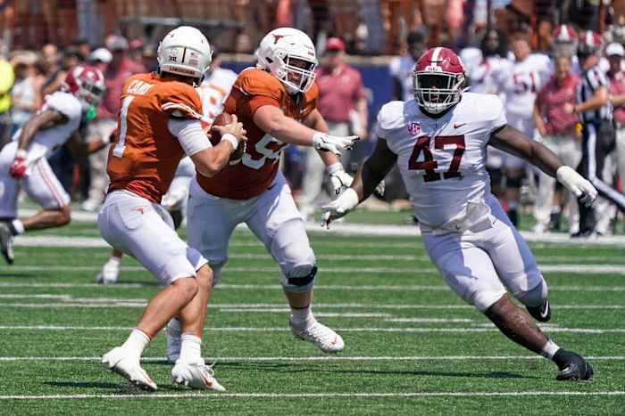 Sep 10, 2022; Austin, Texas, USA; Alabama Crimson Tide defensive lineman Byron Young (47) rushes during the second half against the Texas Longhorns quarterback Hudson Card (1) during the second half at Darrell K Royal-Texas Memorial Stadium. Mandatory Credit: Scott Wachter-USA TODAY Sports