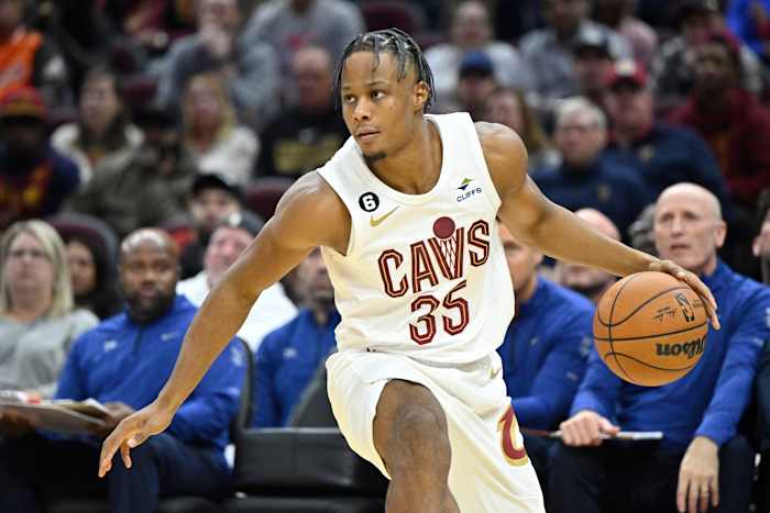 Oct 10, 2022; Cleveland, Ohio, USA; Cleveland Cavaliers forward Isaac Okoro (35) dribbles the ball in the third quarter against the Philadelphia 76ers at Rocket Mortgage FieldHouse. Mandatory Credit: David Richard-USA TODAY Sports