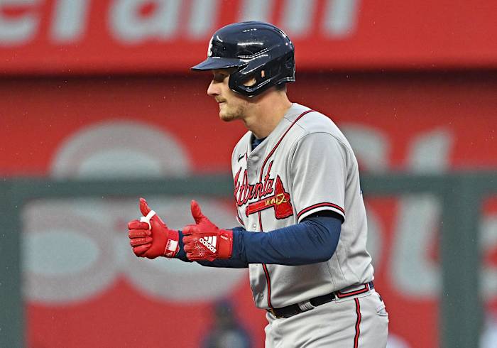 Apr 15, 2023; Kansas City, Missouri, USA; Atlanta Braves catcher Sean Murphy (12) reacts after hitting an RBI double during the first inning against the Kansas City Royals at Kauffman Stadium.