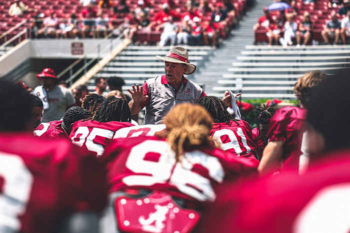 Nick Saban talks to the Crimson Tide after the scrimmage on April 15, 2023