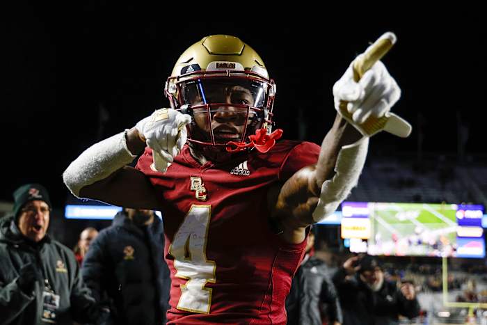 Nov 26, 2022; Chestnut Hill, Massachusetts, USA; Boston College Eagles wide receiver Zay Flowers (4) signals first down after a catch against the Syracuse Orange during the second half at Alumni Stadium.