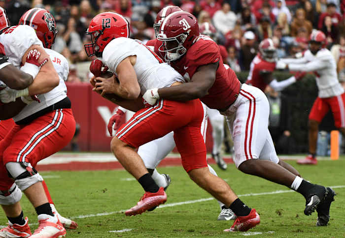 Nov 19, 2022; Tuscaloosa, Alabama, USA; Austin Peay quarterback Mike DiLiello (12) is tackled by Alabama linebacker Will Anderson Jr. (31) at Bryant-Denny Stadium.