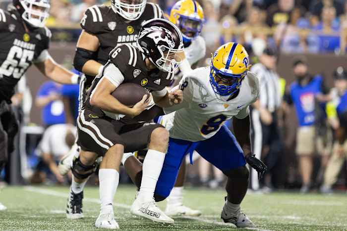 Sep 17, 2022; Kalamazoo, Michigan, USA Western Michigan Broncos quarterback Jack Salopek (6) runs the ball against Pittsburgh Panthers defensive tackle Calijah Kancey (8) at Waldo Stadium.