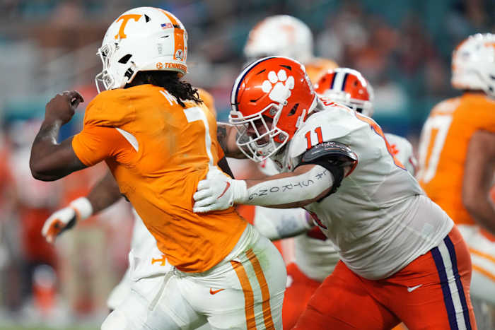 Dec 30, 2022; Miami Gardens, FL, USA; Clemson Tigers defensive tackle Bryan Bresee (11) sacks Tennessee Volunteers quarterback Joe Milton III (7) during the first half of the 2022 Orange Bowl at Hard Rock Stadium.