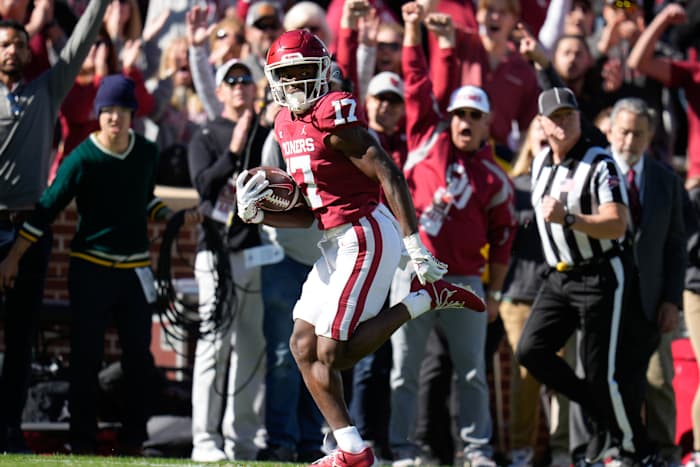 Nov 5, 2022; Norman, Oklahoma, USA; Oklahoma Sooners wide receiver Marvin Mims (17) makes a touchdown catch against the Baylor Bears during the first half at Gaylord Family-Oklahoma Memorial Stadium. Mandatory Credit: Chris Jones-USA TODAY Sports