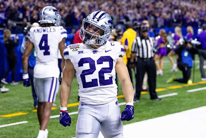 Dec 31, 2022; New Orleans, LA, USA; Kansas State Wildcats running back Deuce Vaughn (22) celebrates his touchdown scored against the Alabama Crimson Tide during the first half in the 2022 Sugar Bowl at Caesars Superdome. Mandatory Credit: Stephen Lew-USA TODAY Sports