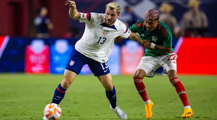 Jordan Morris playing against Julian Araujo.