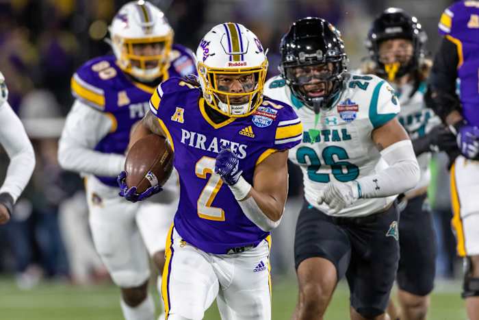 Dec 27, 2022; Birmingham, Alabama, USA; East Carolina Pirates running back Keaton Mitchell (2) runs for a gain against the Coastal Carolina Chanticleers in the 2022 Birmingham Bowl at Protective Stadium.