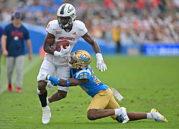 Sep 17, 2022; Pasadena, California, USA; South Alabama Jaguars wide receiver Jalen Wayne (0) runs for a first down before he is forced out of bounds by UCLA Bruins defensive back Jaylin Davies (24) in the first half at the Rose Bowl.