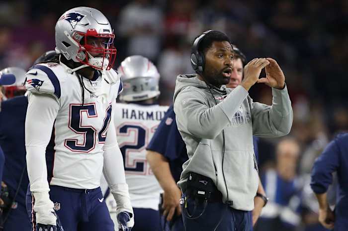 Jerod Mayo coaching on the sideline.