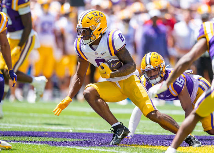 LSU Tigers running back Malik Nabers carries the ball.