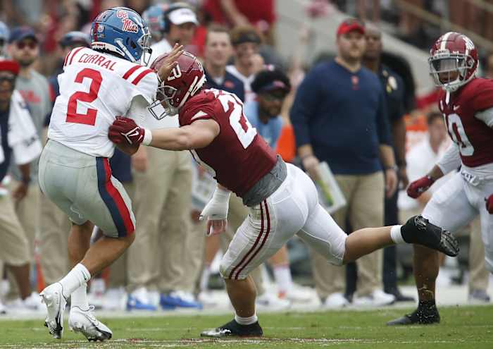 Oct 2, 2021; Tuscaloosa, Alabama, USA; Alabama linebacker Drew Sanders (20) pressures Ole Miss quarterback Matt Corrall (2) as he release the ball at Bryant-Denny Stadium. Mandatory Credit: Gary Cosby-USA TODAY Sports